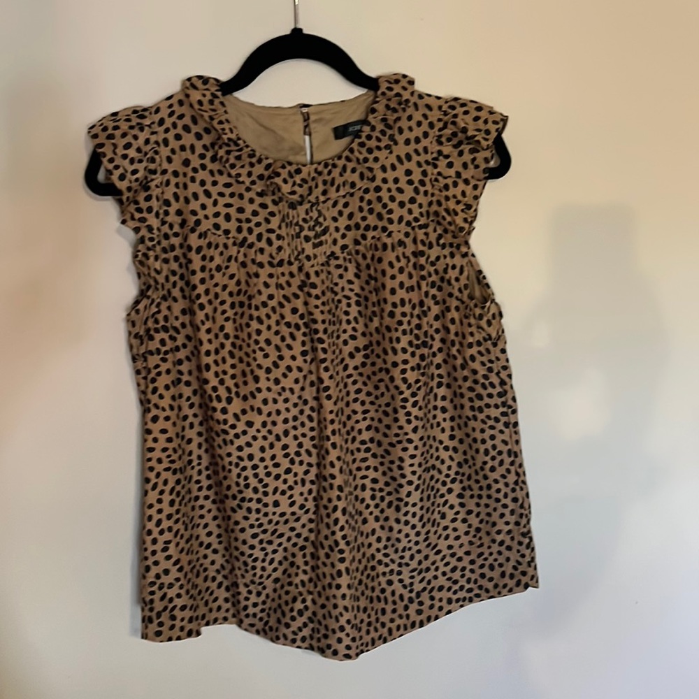JCrew Leopard Print Ruffle Neck Blouse with button closure on the back.